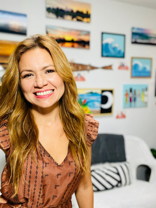 Purposeful Dreamer Karina Hines in front of the first Purposeful Dreamer Art Collection 2020-2021